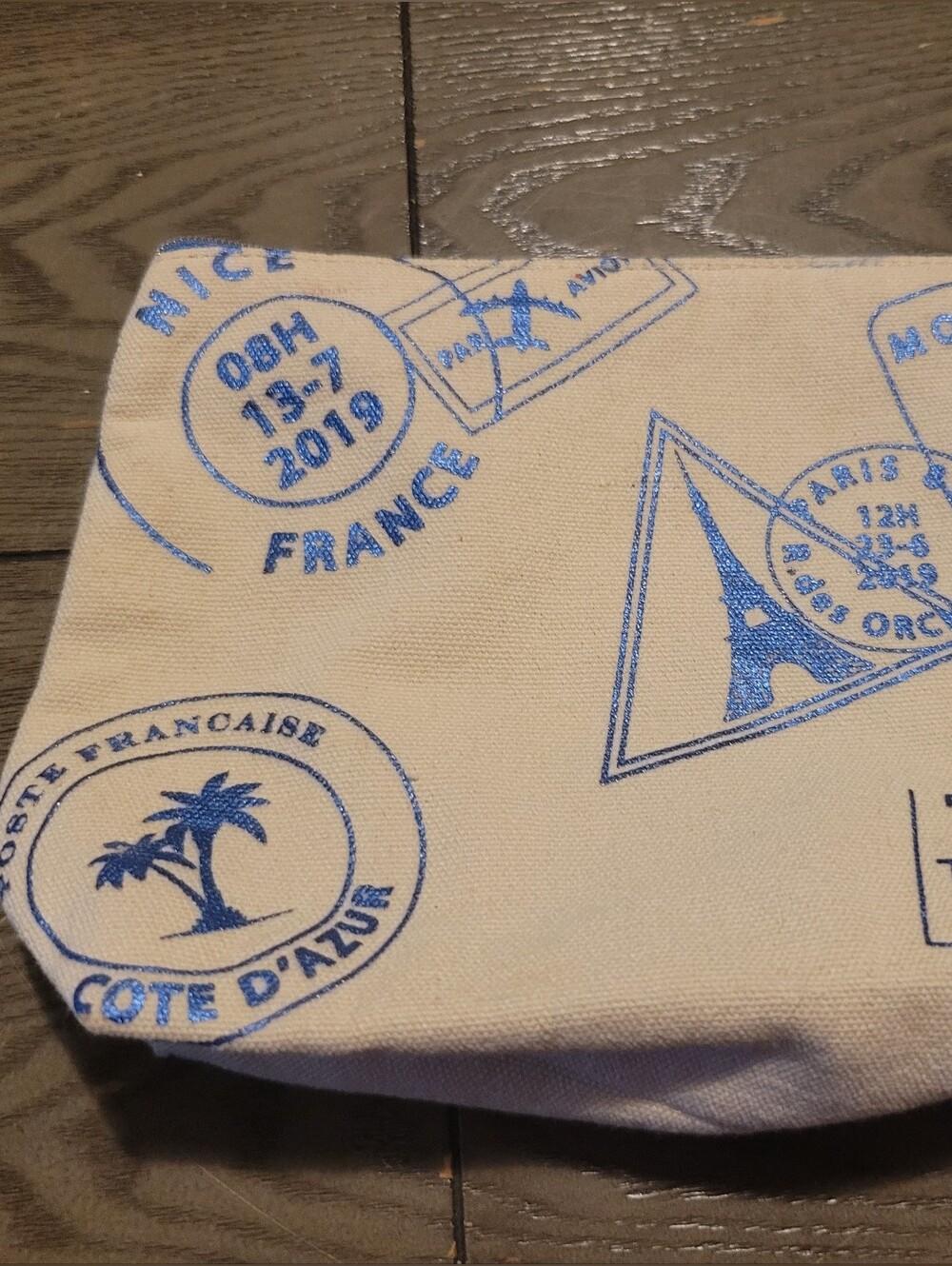 Lancome Cream Canvas Toiletry Pouch with Blue Travel Stamp Print